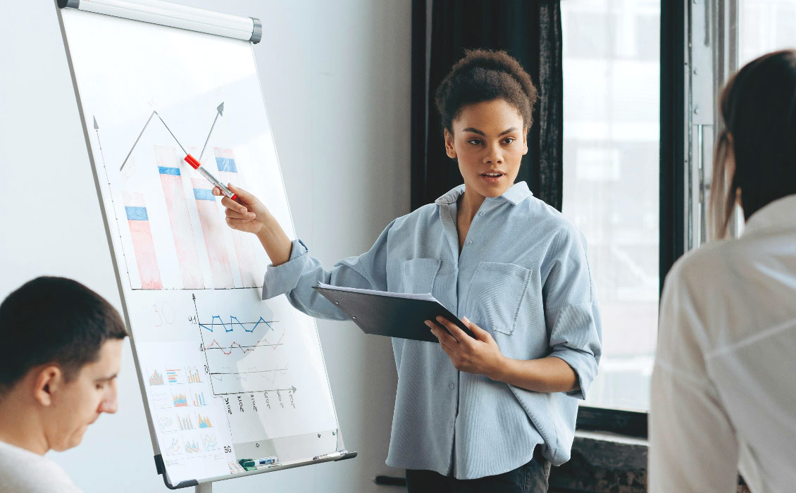 Woman presenting with flip-chart